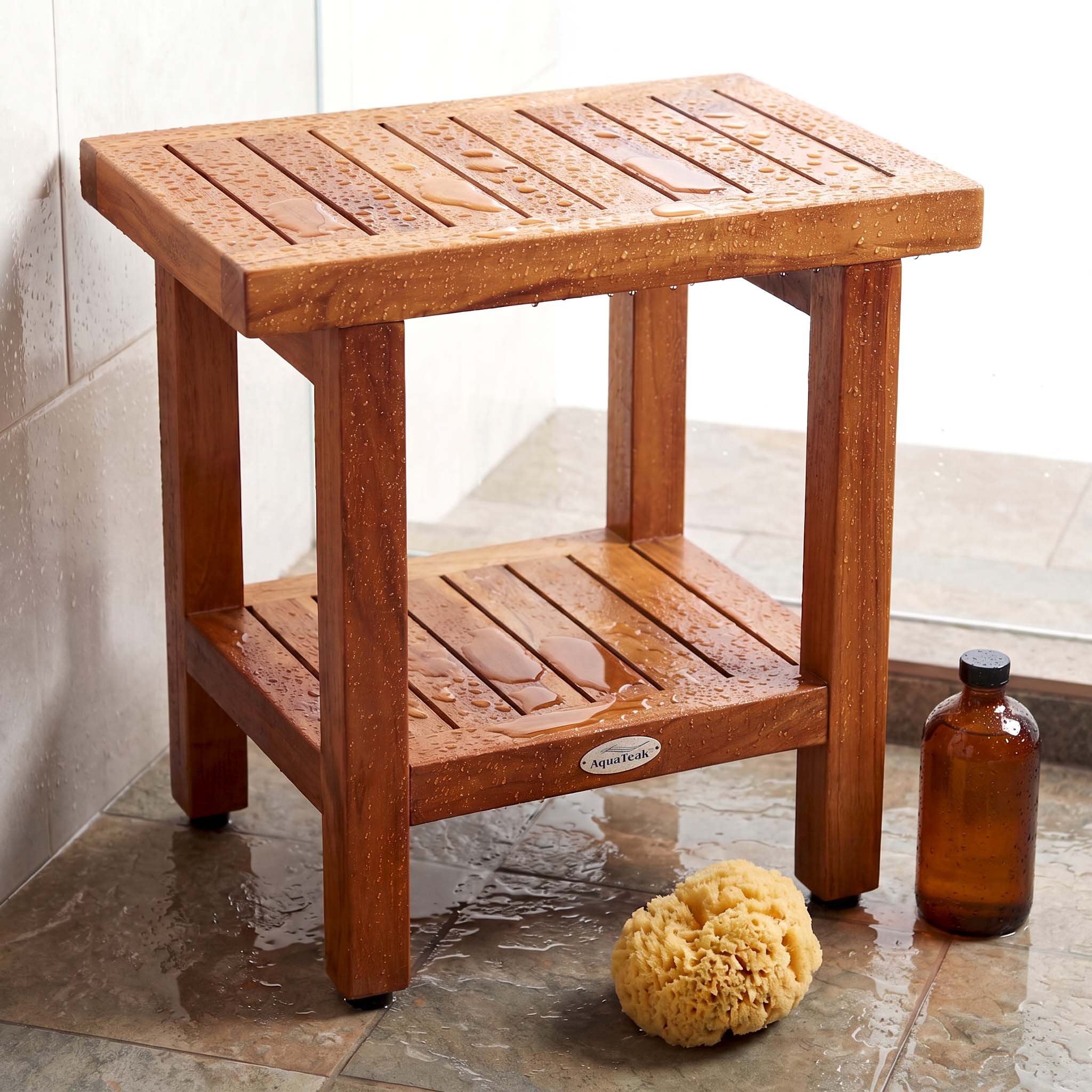 Rectangular AquaTeak bench with a lower shelf in a shower