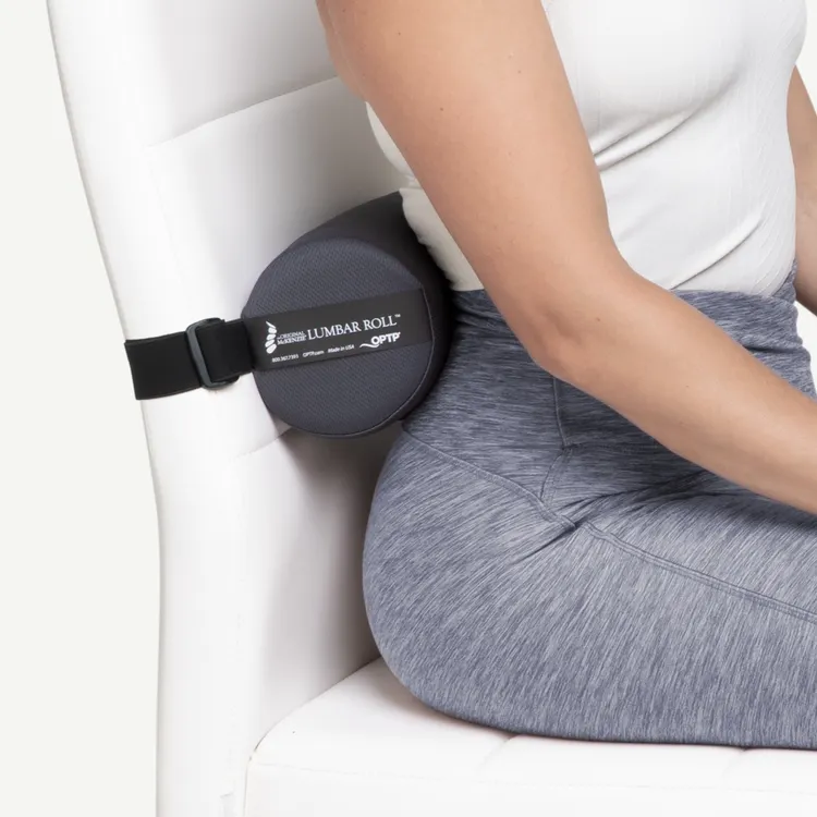 The Original McKenzie lumbar roll supporting a seated person