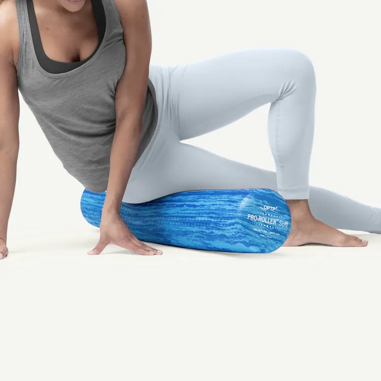 Person using an OPTP PRO-ROLLER Soft foam roller